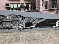 03C Alex Senna - elongated mural of man and dog - detail 2 street art Hong Kong